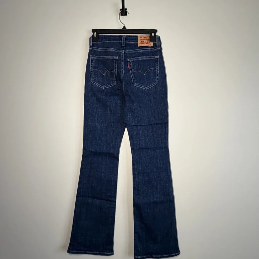 Never worn - Levi's Dark Blue Boot Cut Jeans